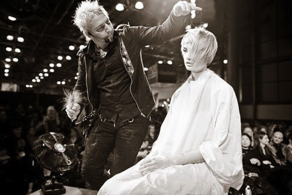 Woody Michleb styling hair live on stage